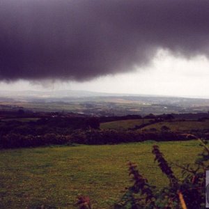 A black cloud threatens the view of the approaching eclipse of the sun