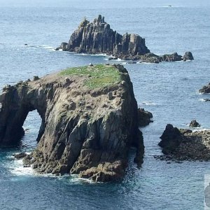 Ennis Dodman (foreground) and the Armed Knight, Land's End