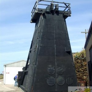 Weatherboarded headgear at Skip Shaft, Levant Mine