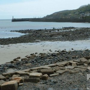 Remnants of the old sea wall at Tolcarne - South Pier in the distance