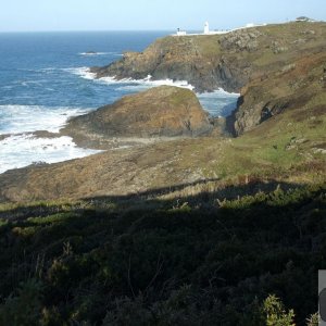 View across the Enys (island) to pendeen Lighthouse