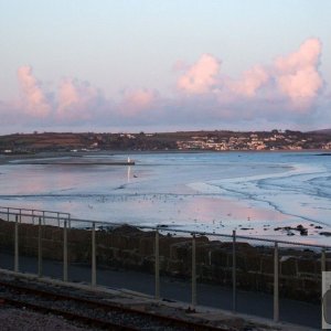 Sunset over Eastern Green and Long Rock to Marazion