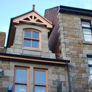 Upper storeys of Bateman's Market (right) and adjoining building