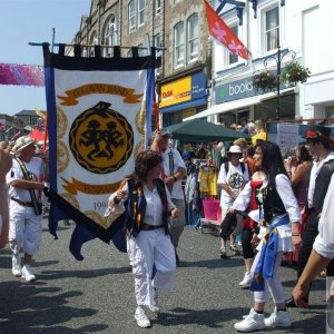 The Golowan Band lead the Noon Parade.