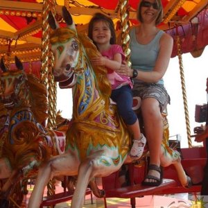 Mum and daughter on the carousel, Quay Fair, Mazey Day - 26Jun10