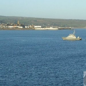 A naval ship (or fisheries vessel) bound for Newlyn Harbour