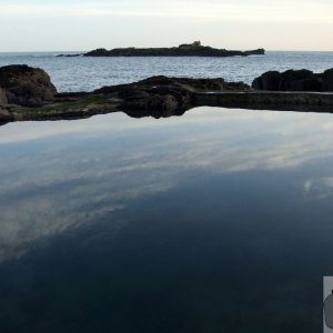 The tidal bathing pool, Mousehole and St Clement's Isle