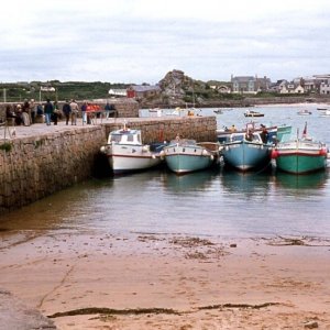 St Mary's harbour small pier with launches at rest, 1977