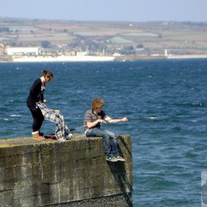 Fishing and Sunbathing