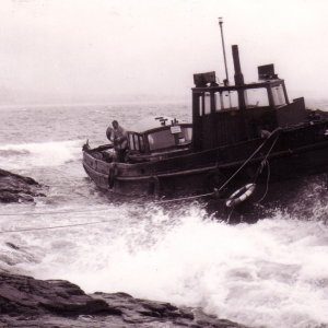 Ex Naval launch on Battery Rocks