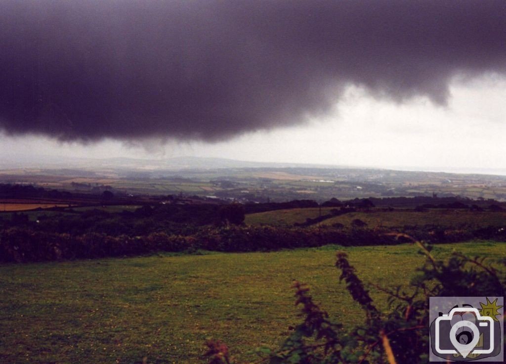 A black cloud threatens the view of the approaching eclipse of the sun