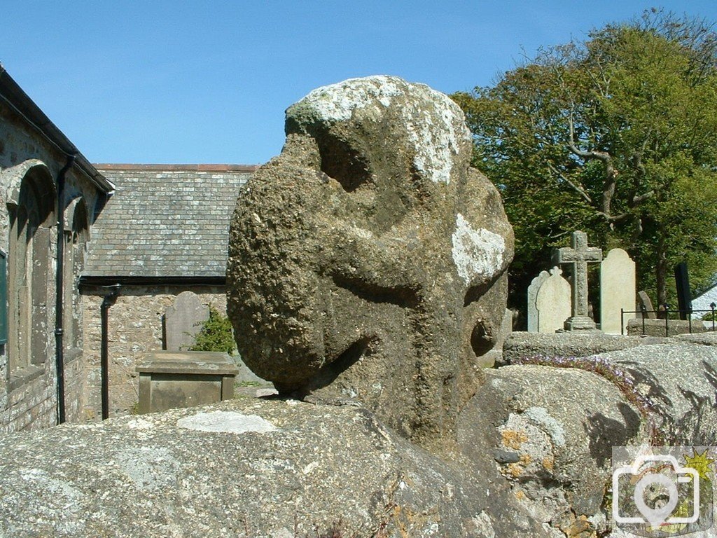 Cross on churchyard wall, Paul