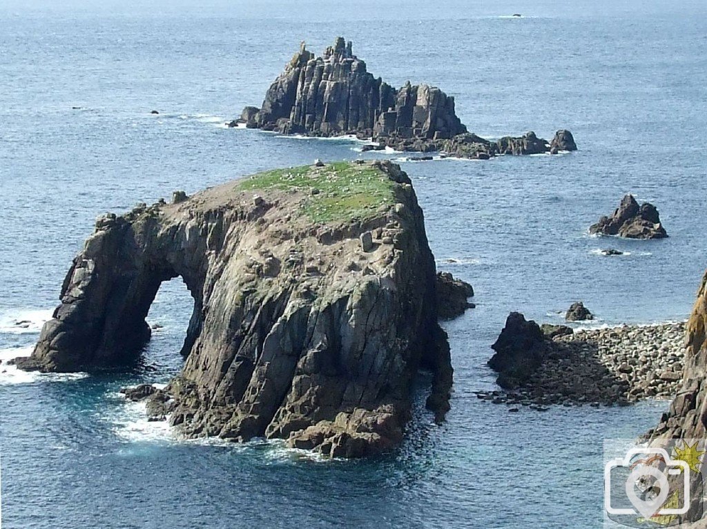 Ennis Dodman (foreground) and the Armed Knight, Land's End