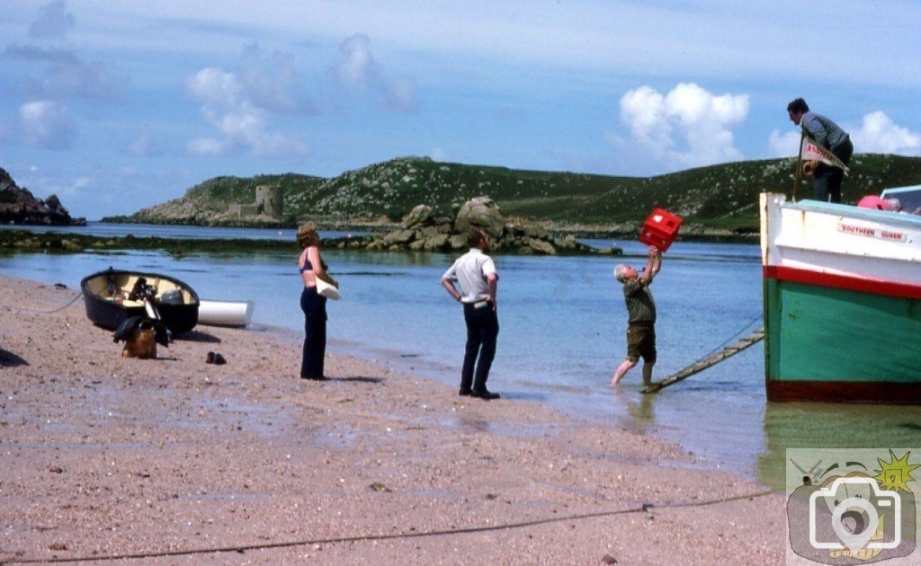 Landing on Bryher - Father-in-law helps boatman