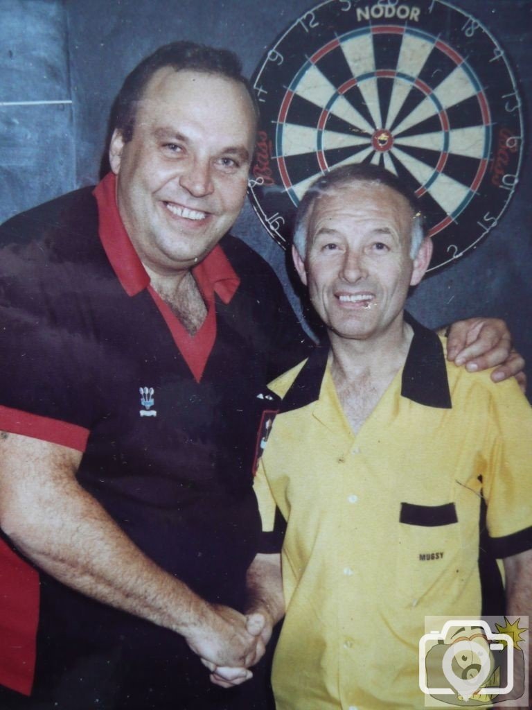 Mugsy with darts pro Cliff Lazarenko