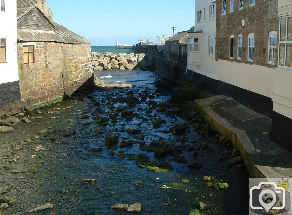 Newlyn Coombe river going out to the sea, 11th May, 2005