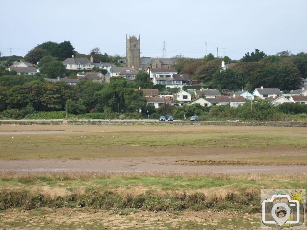 Phillack churchtown across the estuary at low tide