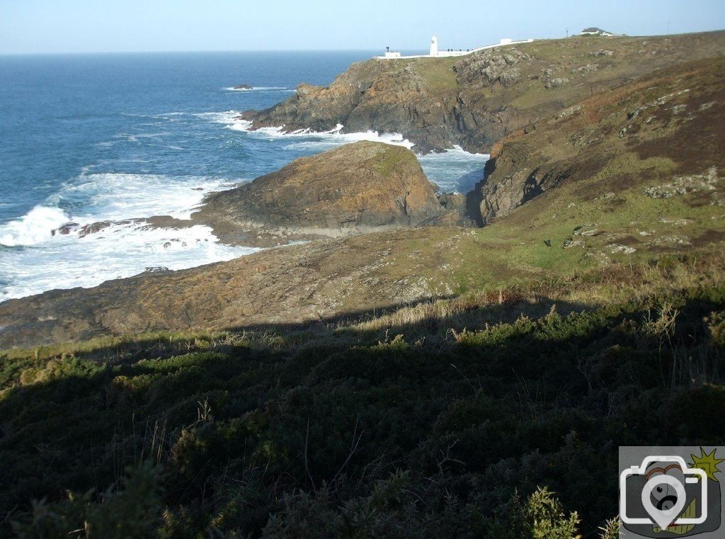 View across the Enys (island) to pendeen Lighthouse