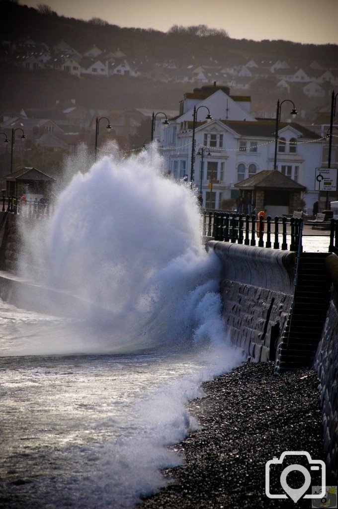 Waves crashing over Penzance Promenade