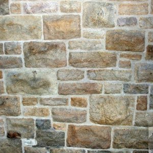 Pointing of granite in the Post Office wall, Penzance.