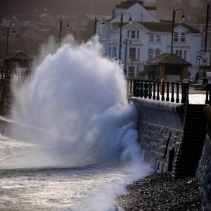 Waves crashing over Penzance Promenade