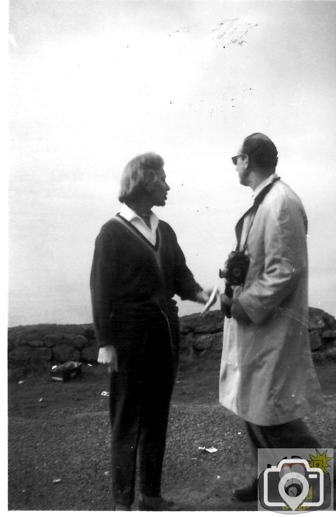 Mrs Billy Butlin and a press photographer at Land's End