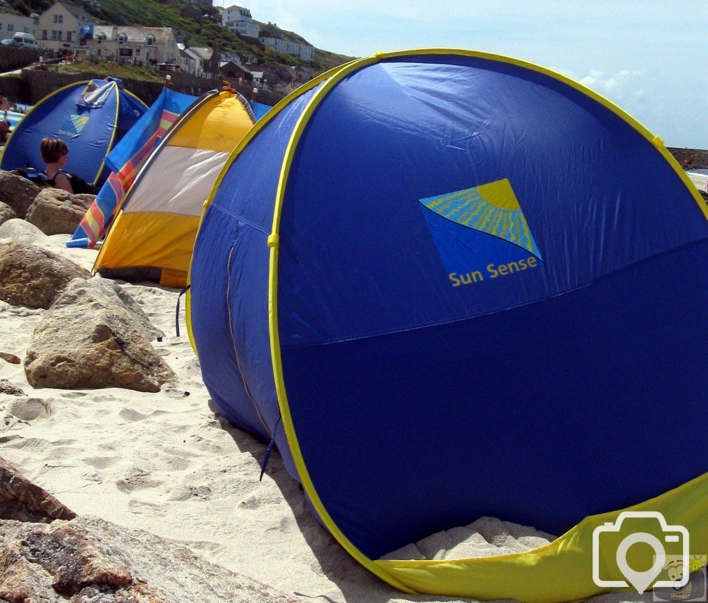 Sennen Beach 2009-07-23 - shelter from the sun